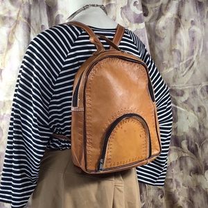 Tan leather backpack